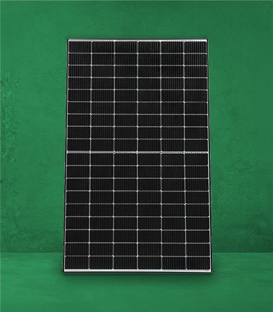 a solar panel on a green wall